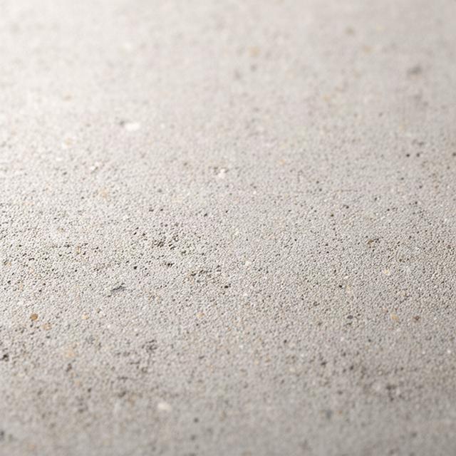 Nahaufnahme einer präzisen Betonoberfläche mit feiner gleichmässiger Struktur